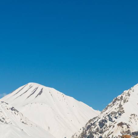 Majestic Winter Peaks High Mountains Blanketed in Snow