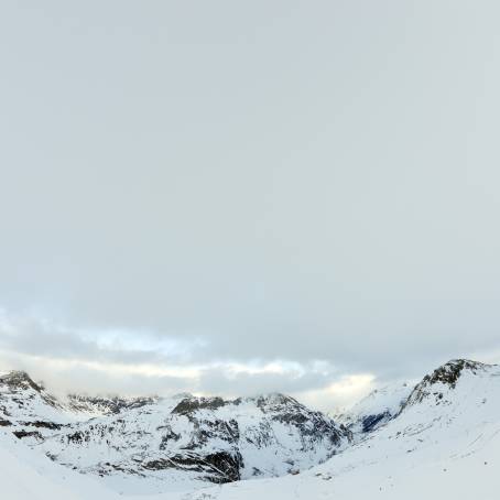 Alpine Winter High Mountains Adorned in Snow