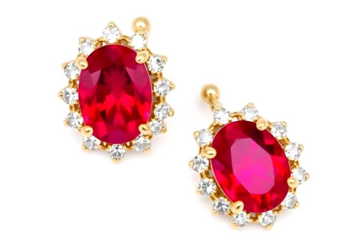 Dazzling Ruby Earrings Surrounded by Diamonds Isolated on White