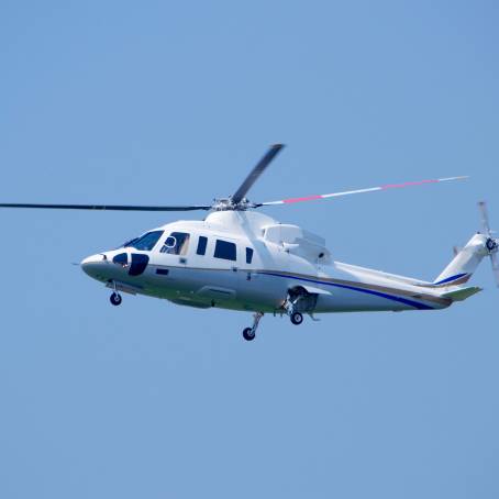 Skyward Journey Helicopter Soaring Through Clouds