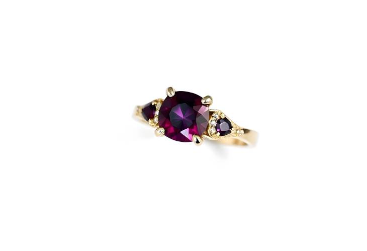 Gorgeous Rhodolite Garnet and Diamond Ring on White Isolate