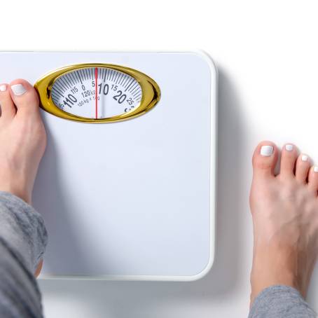 Compact and Reliable Weighing Scale on a Clean Background