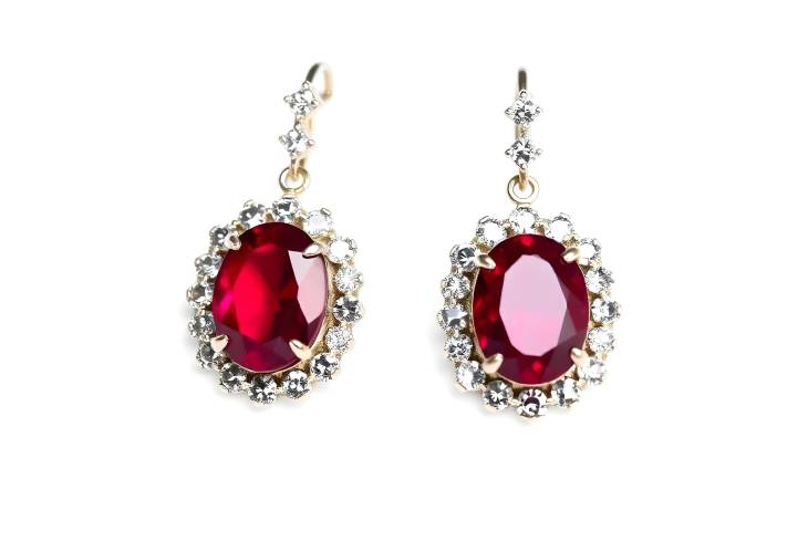 Elegant Red Ruby Earrings with Diamond Accents on White Background