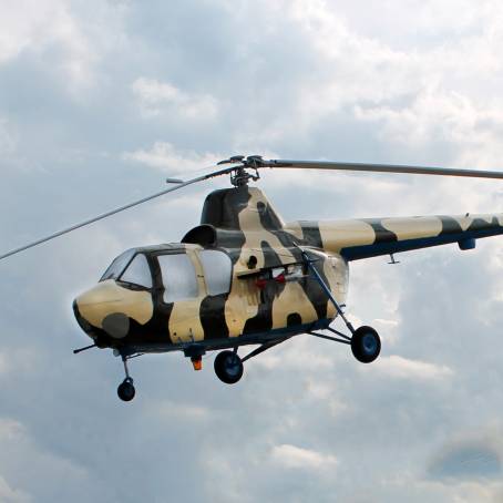 Aerial Wonders Helicopter Gliding Through Clouds