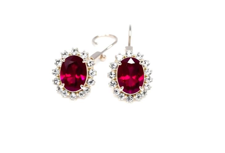 Sophisticated Ruby Earrings with Diamond Details on White Isolate