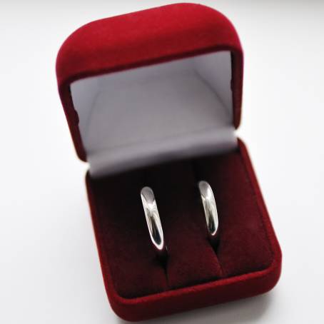 Rings of Commitment Two Wedding Bands in a Red Box