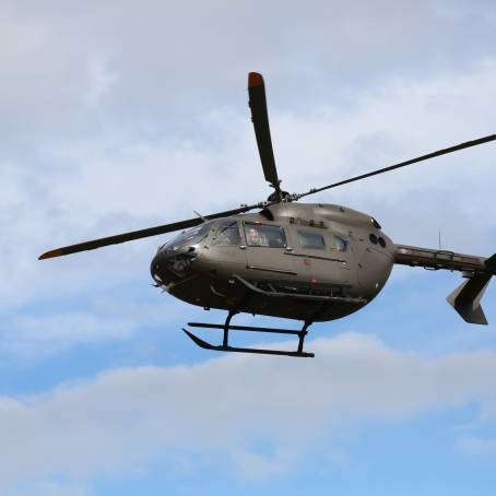 Cloudscape Flight Helicopter Against Dramatic Skies