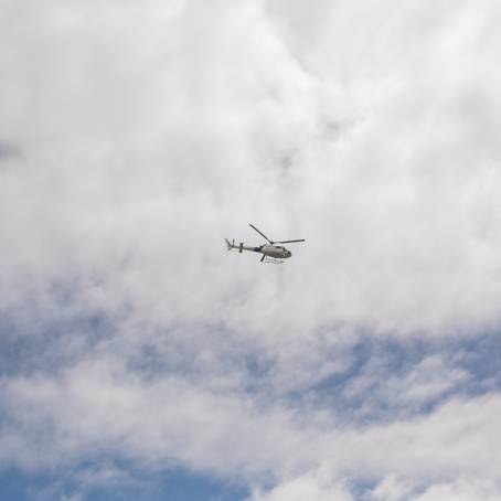 Aerial Perspectives Helicopter Against the Clouds