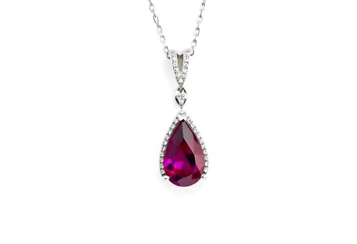 Gorgeous Pear Shape Ruby and Diamond Pendant on White Background